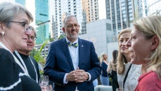 AIA Corporate partners networking outside