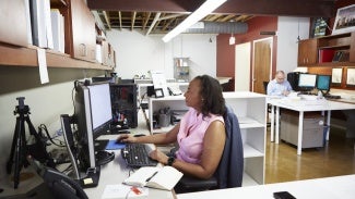 AIA member working at computer
