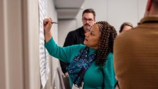 AIA female collaborating with male 