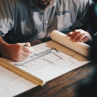 Architect drawing a design