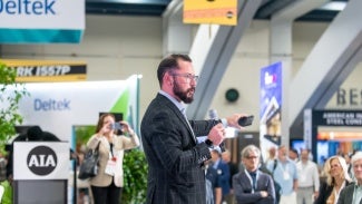 Male speaker at CE session at AIA conference of architecture and design