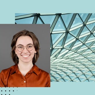 emily almloff aia headshot on light blue background