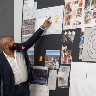 lpa staff architect pointing at diagram during sustainability workshop
