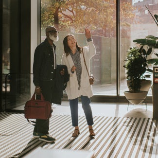 Visitors exploring the campus through the walking tour.