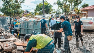 image of community gathering after disaster