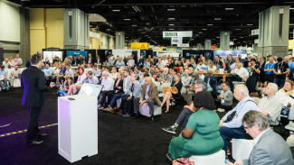 Male speaker at CE session at AIA conference of architecture and design