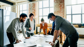 Architects working around a table