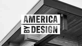The America by Design logo over a building's exterior