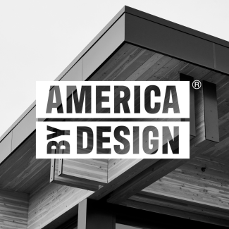 The America by Design logo over a building's exterior