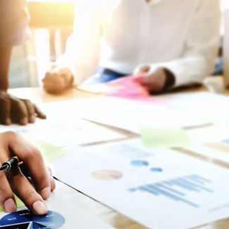 AIA member reviewing charts on their desk